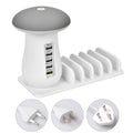 White USB charging station with five ports and mushroom-shaped LED desk lamp for multi-device charging