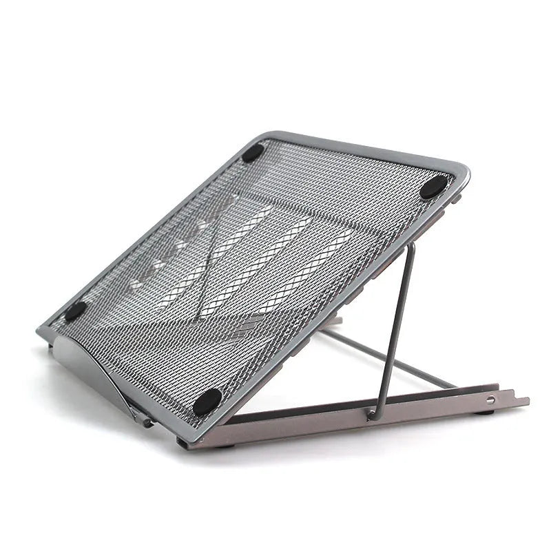 Silver folding laptop stand holding a laptop at an angle