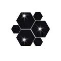 Silver hexagonal acrylic mirror wall sticker with PS build, 100x85x50mm, on a wall surface