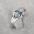 Women's geometric ellipse ring with inlaid zircon stones in white gold colour