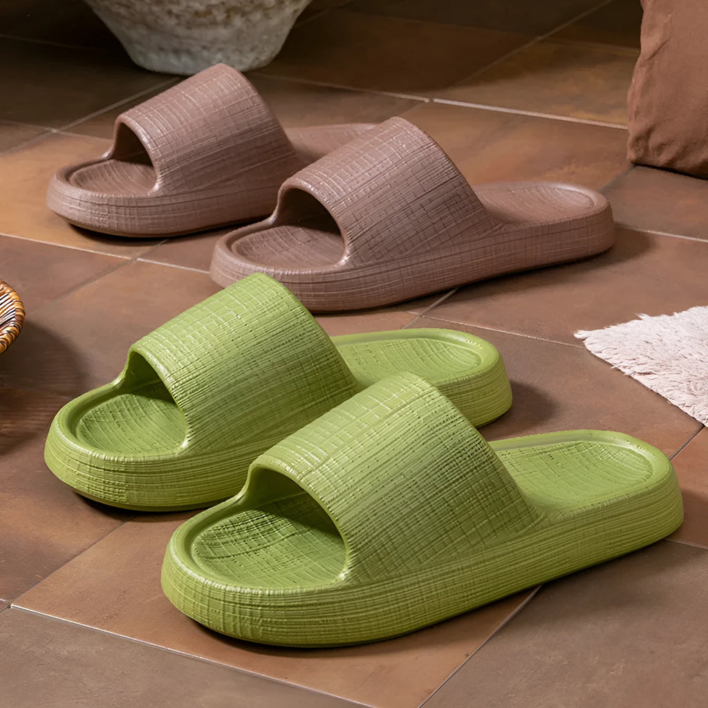 A pair of soft EVA flip flop slippers with a toe ring and non-slip sole, shown in one of five available colours.