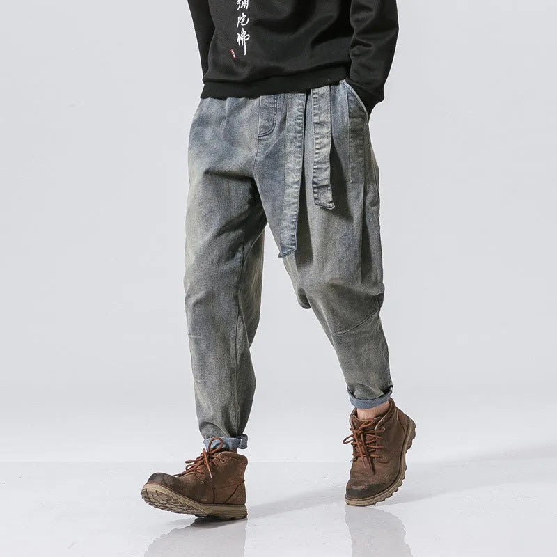 Punk stretch bike denim jeans in solid colour with elastic waist and patches