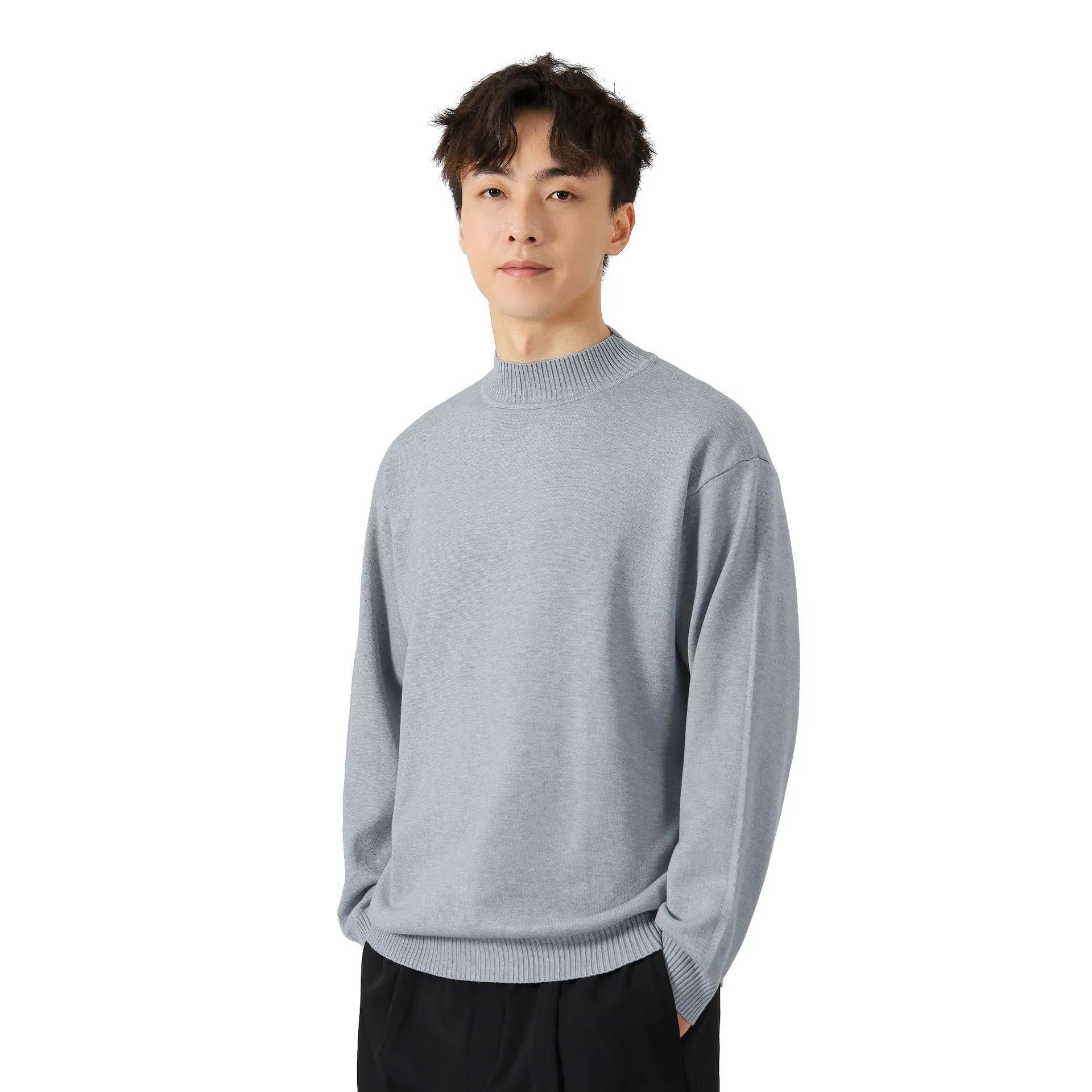 Men's loose fit long sleeve casual jumper in army green colour on a hanger.