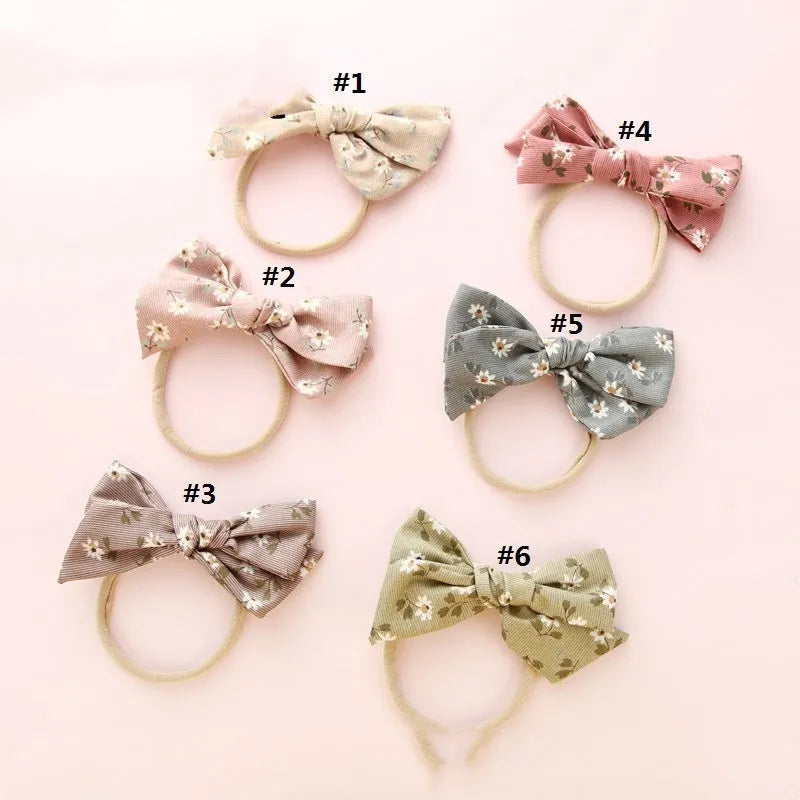 Children's fabric hairband with knotted bow design in multiple colours from Princess series