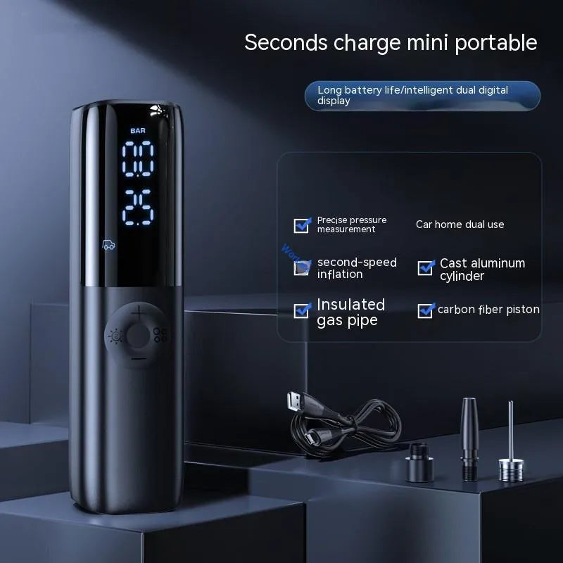 Black portable electric vehicle air pump with pressure gauge and inflation tube