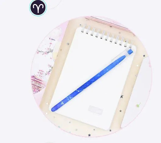 Boxed set of 12 constellation-themed quick-drying gel pens with plastic barrels.
