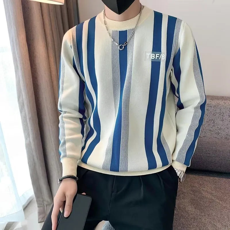 Blue and white contrast stripe long-sleeved pullover sweater, loose fit knitwear with V-neck.