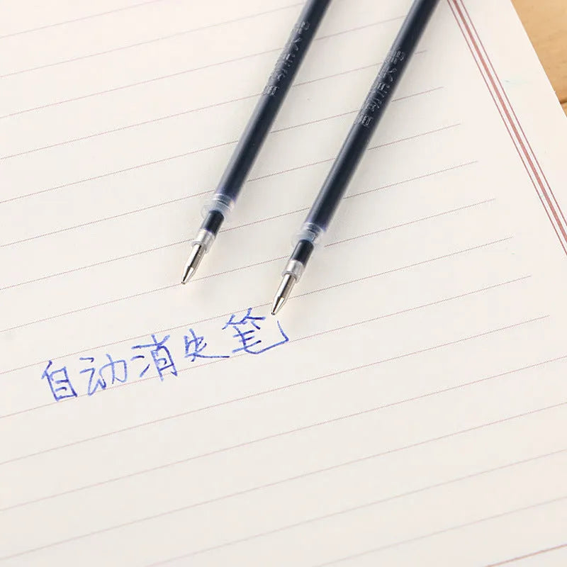 Automatic fade and disappear pen set showing pen holder, case, and eight refills