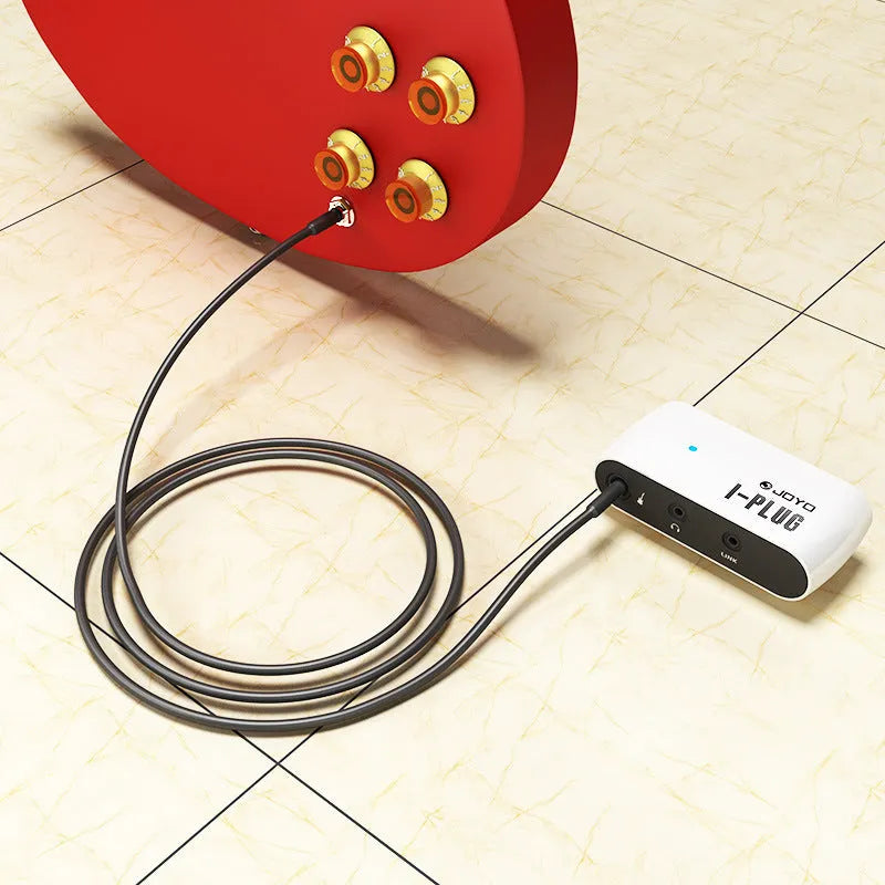 White metal distortion headphone amplifier with 6.35mm jack for guitar practice