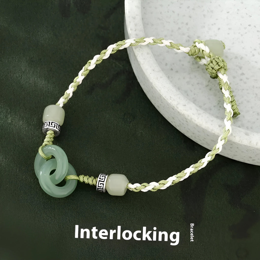 Women's ethnic style copper bracelet with peace buckle and double ring design in green.