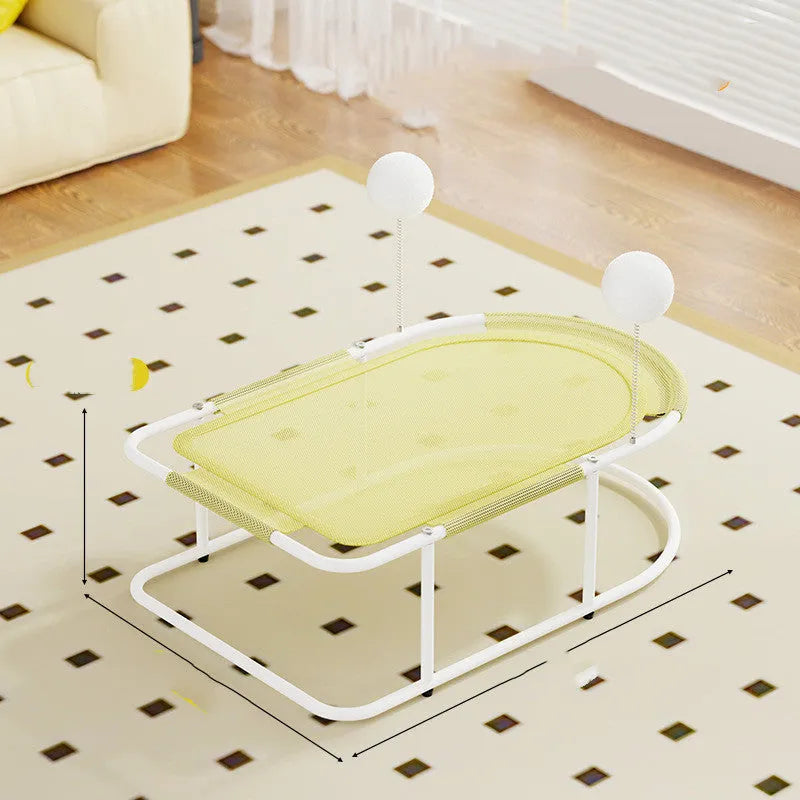 Grey fabric cat kennel with a metal bracket frame on a wooden floor.