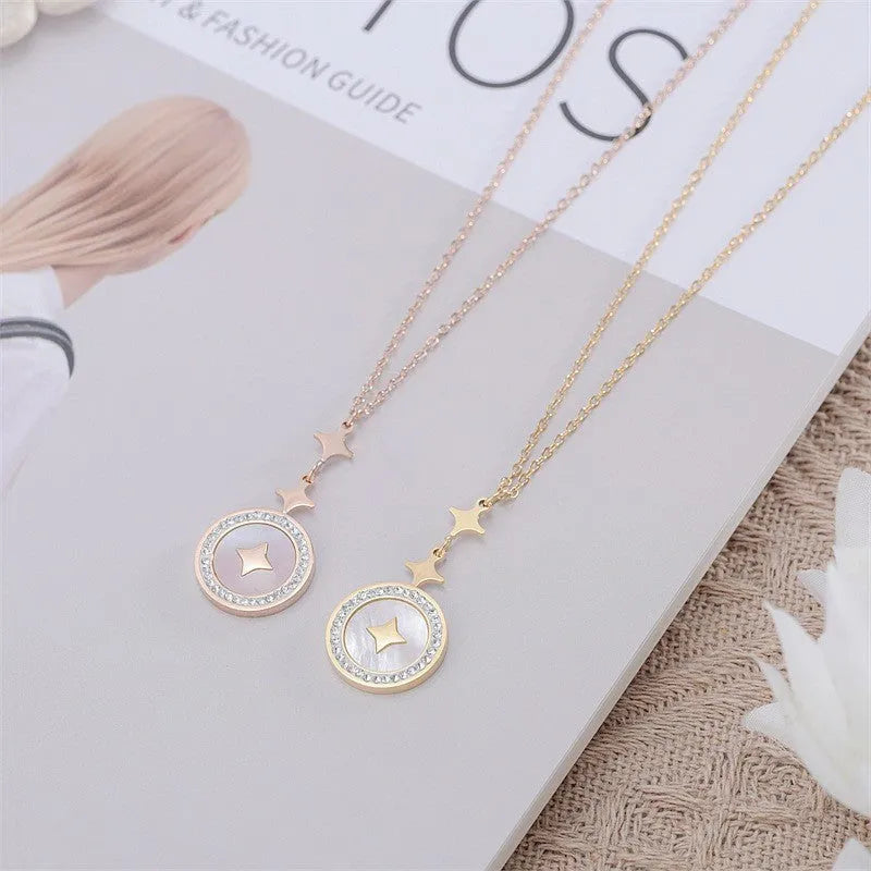 Close-up of a women's geometric six-pointed star titanium steel necklace on a model, showing rose gold and gold colour options.