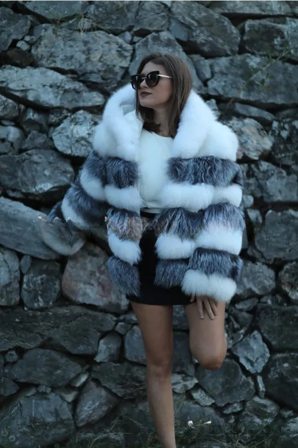 Loose-fitting women's hooded coat in artificial fur, shown in brown and silver fox colours.