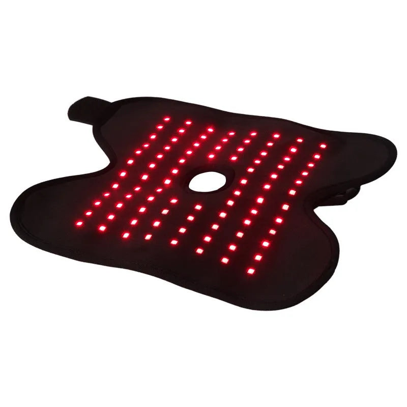 Black adjustable ankle support with red light and heating, USB cable attached