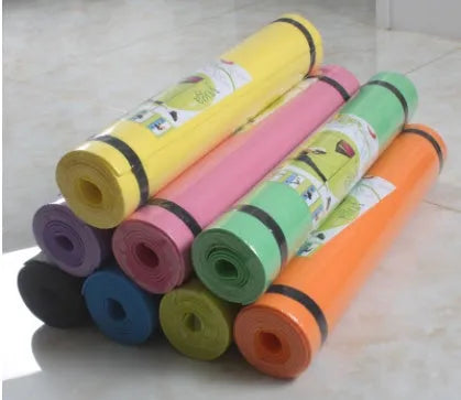 EVA fitness yoga mat in blue showing thickness and non-slip surface texture