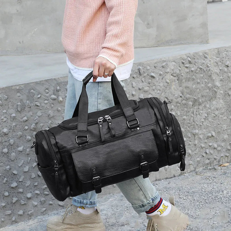 Black large capacity travel shoe storage bag with PU exterior, shown with dimensions 52cm wide by 27cm high.