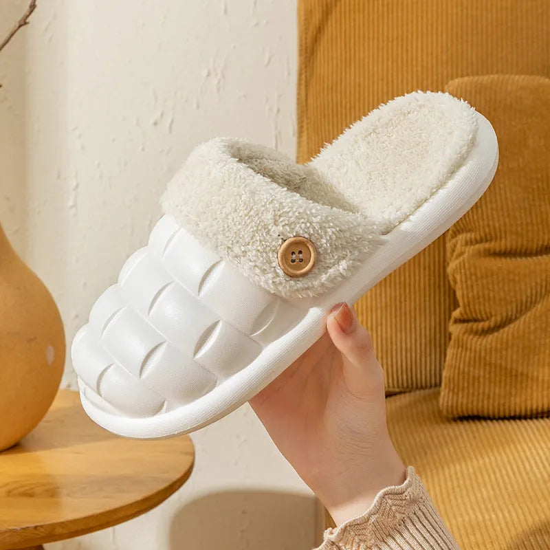 Plaid-patterned detachable women's house slippers with a plush lining and a light-coloured EVA sole.