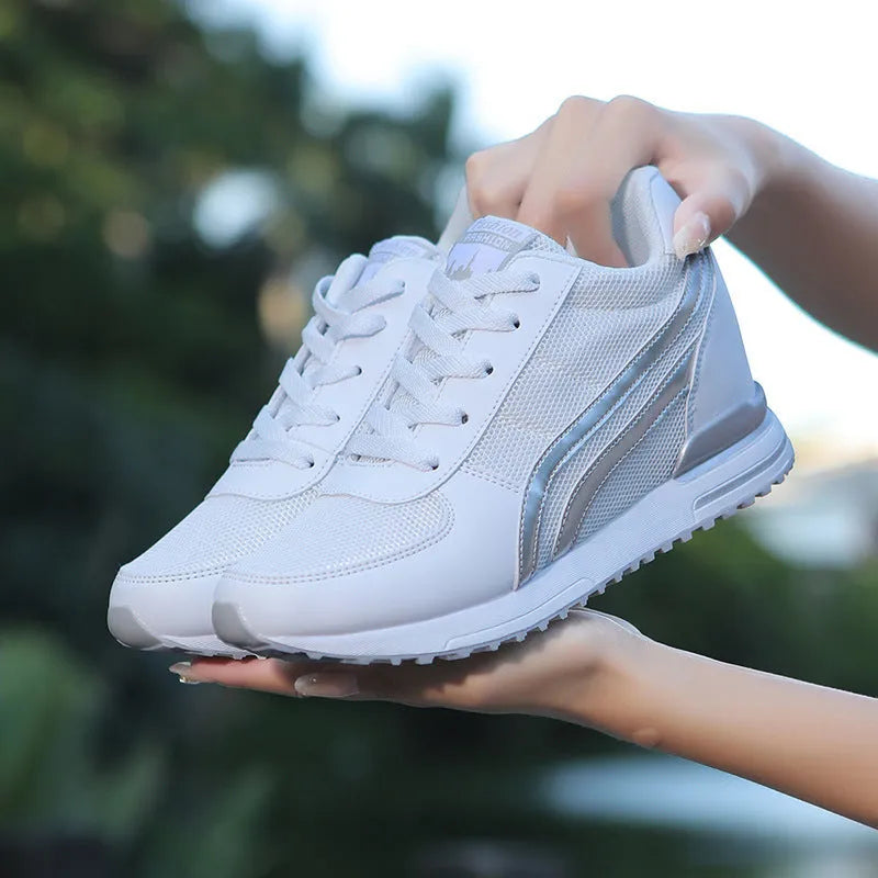 Mesh height increasing casual sneaker in dark blue with front lace-up and low-top design