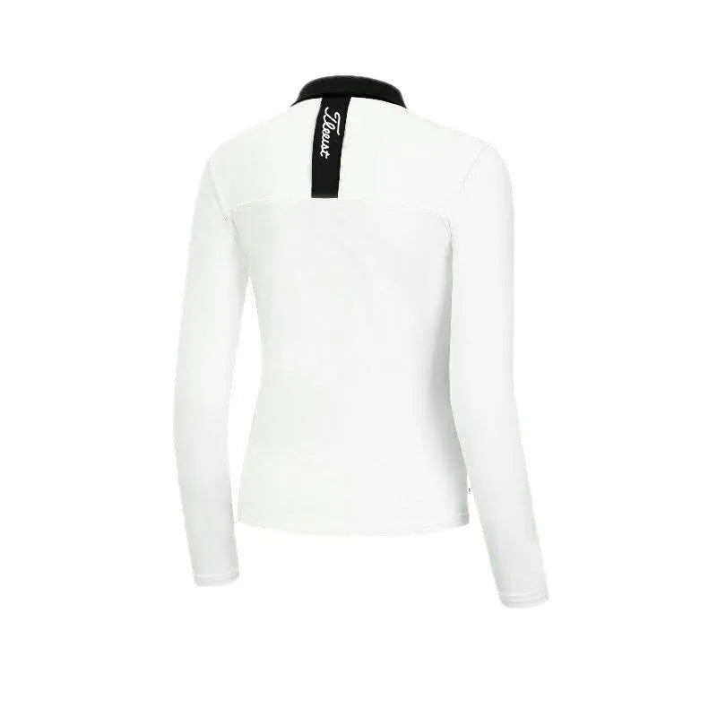 Women's white slim fit long sleeve polyester golf top on a hanger.
