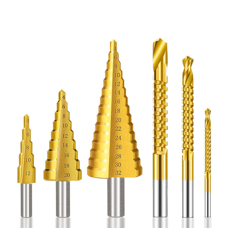 High-speed steel cone step drill bits and a centre punch laid out on a workbench.