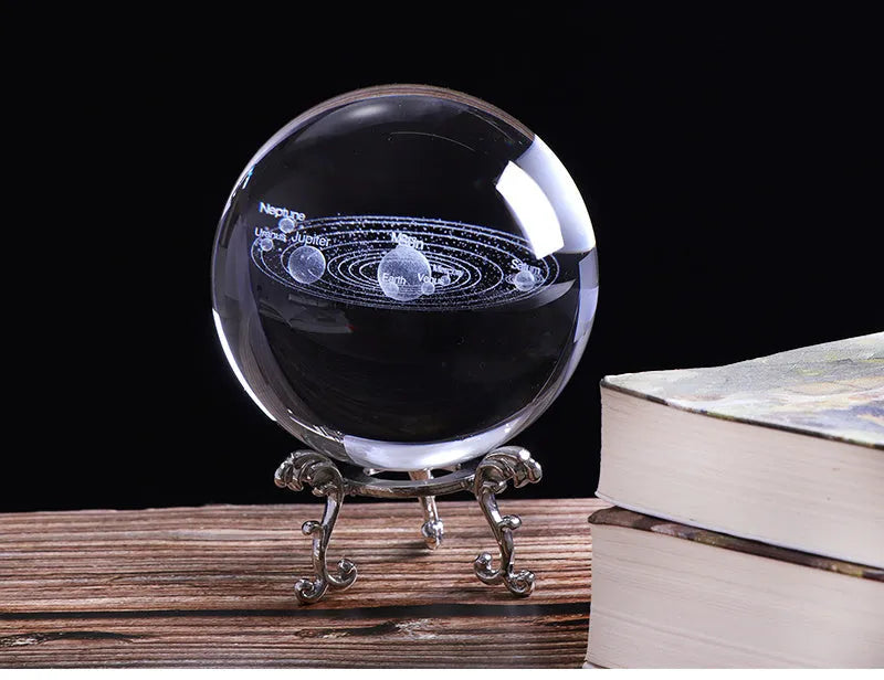 3D engraved solar system inside a clear K9 crystal ball on a gold base, 80mm diameter
