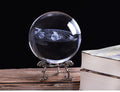 3D engraved solar system inside a clear K9 crystal ball on a gold base, 80mm diameter