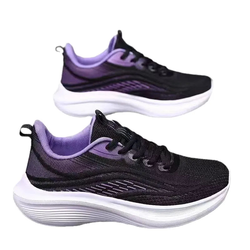 Women's lightweight running shoes with breathable mesh upper, flat heel, and front lace-up closure