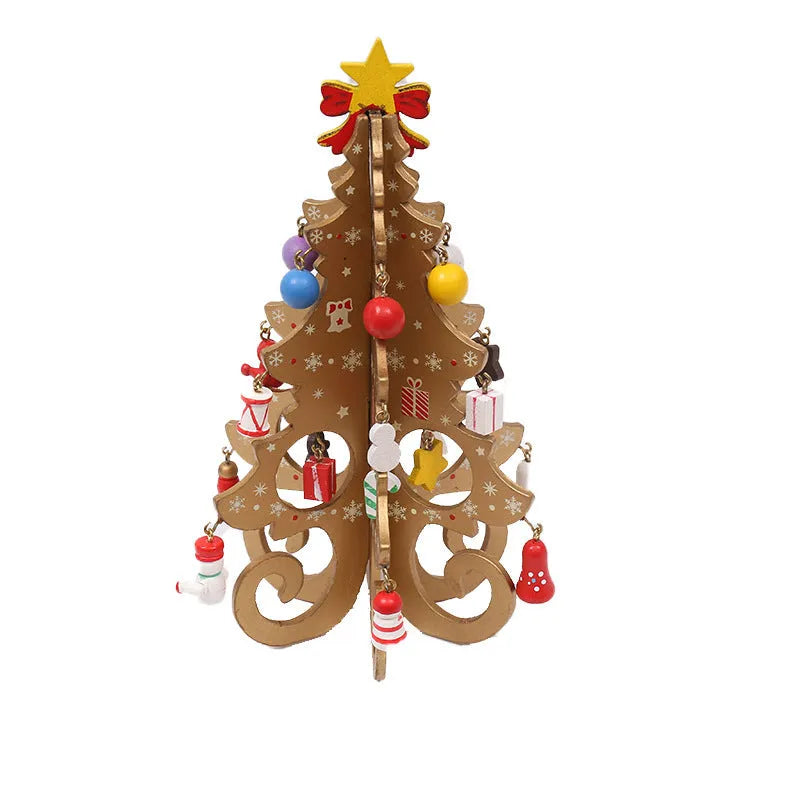 Green MDF Christmas tree ornament with laser-cut detail, 19x10.5cm, on a tree branch
