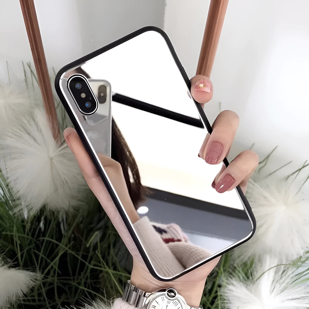 Black iPhone mirror phone case showing reflective surface on back, compatible with iPhone X and Plus models.