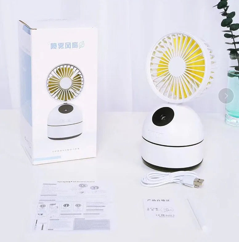 Mini USB fan humidifier in white, side view showing fan blades and mist nozzle