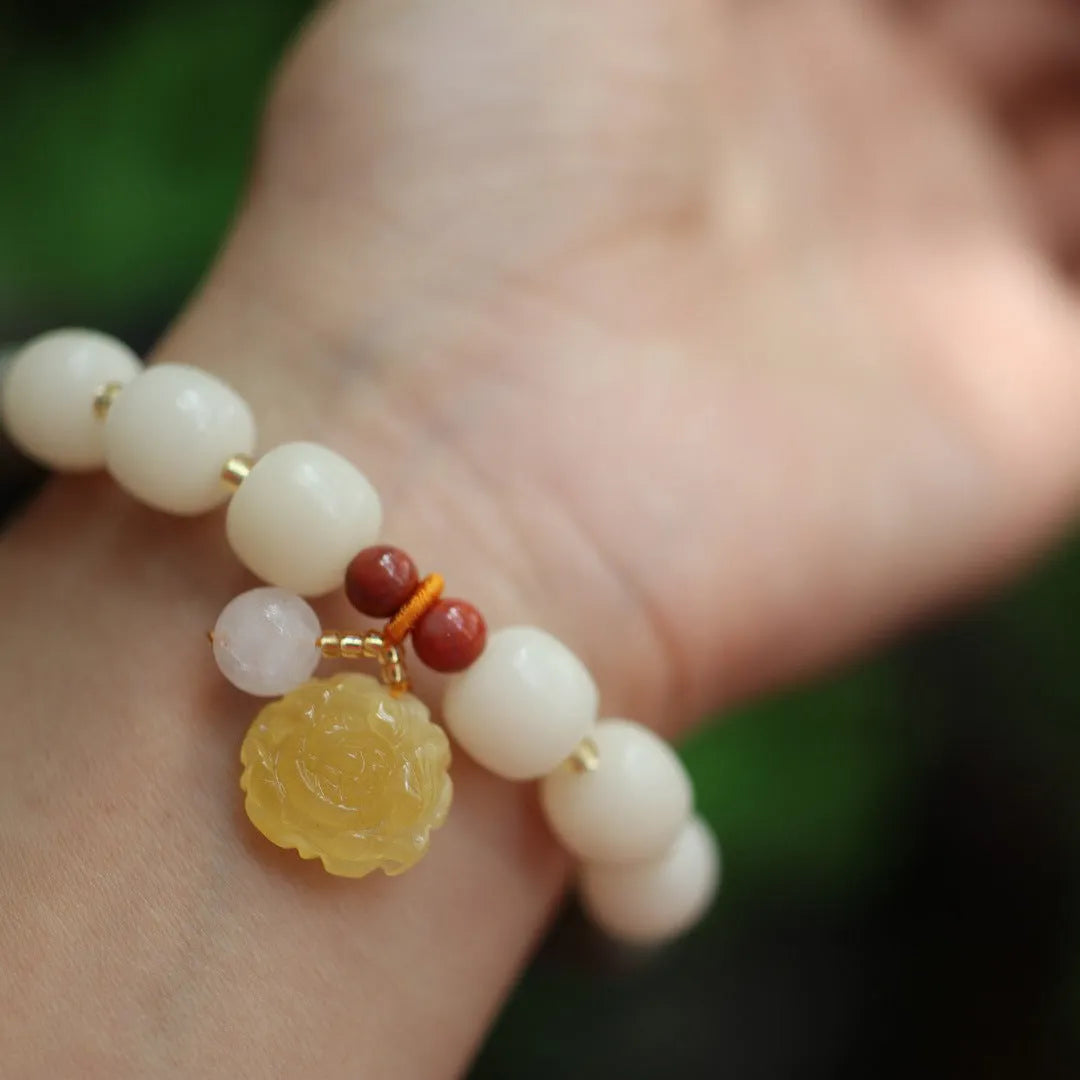 Woven Bodhi root bracelet with gradient white jade colour and natural beeswax Lotus elements, 10mm floral retro design.
