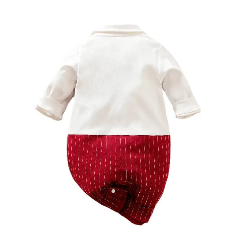 Baby boy wearing a wine red gentleman-style cotton jumpsuit with long sleeves and a single-breasted front.