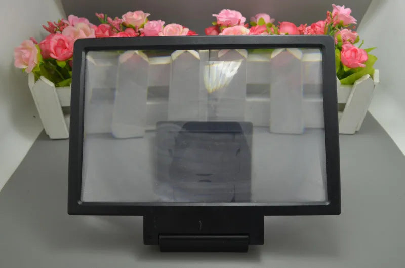 Black and white portable screen magnifier for tablets and smartphones, shown with protective film.