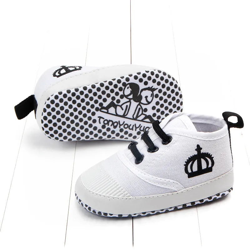 Red and white canvas toddler shoes with elastic band closure in three size options
