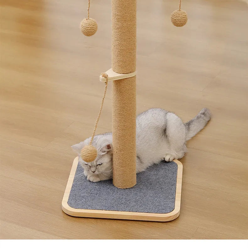 Windmill coloured pine wood cat climbing frame with a hanging ball and carpet leather scratching surfaces.