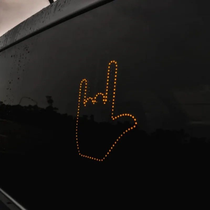 Black plastic LED gesture car light with remote control showing three illumination modes