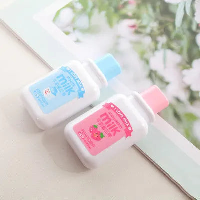 Cute bottle-shaped correction tape dispenser with 6 metres of white correction fluid.