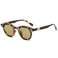 Round retro sunglasses with a metal hinge, shown in black frame with gradient tea lens option.