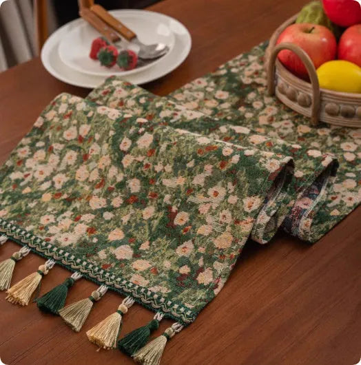 Retro style polyester table flag with long handwoven tassels on a wooden table.