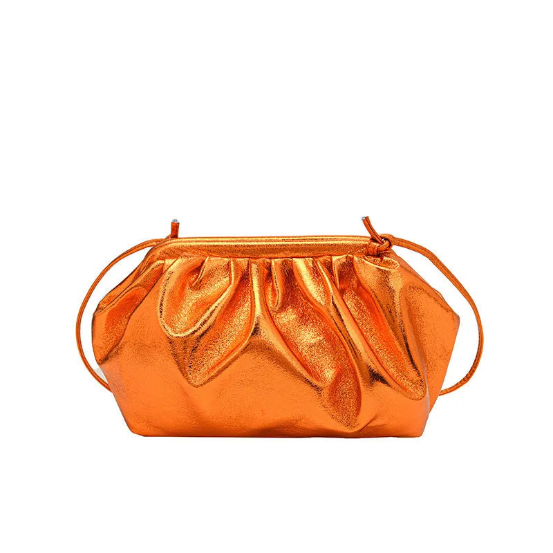 Soft PU crossbody bag in shell shape with internal organiser compartments available in multiple colours