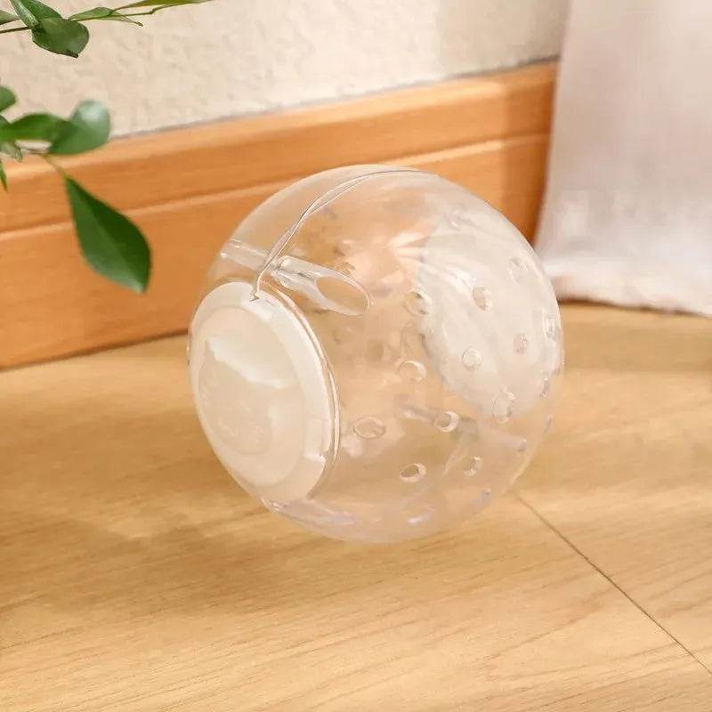 Blue pet slow feeder ball toy with food leakage holes on white background showing 11.5cm diameter