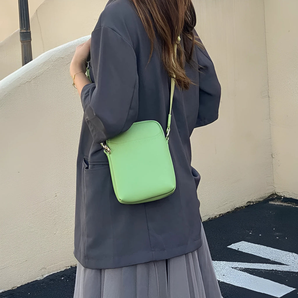 Solid colour PU leather mobile phone crossbody bag measuring 14.5x5.5x19cm