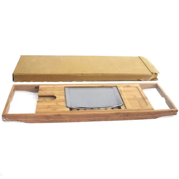 Natural bamboo single-tier desktop shelf for bathroom storage on a bathtub ledge.