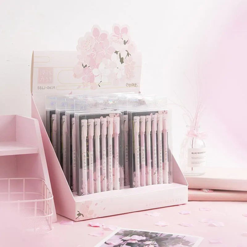 Sakura gel pen set with six black ink pens showing pull-out mechanism and 0.5mm needle tube refills