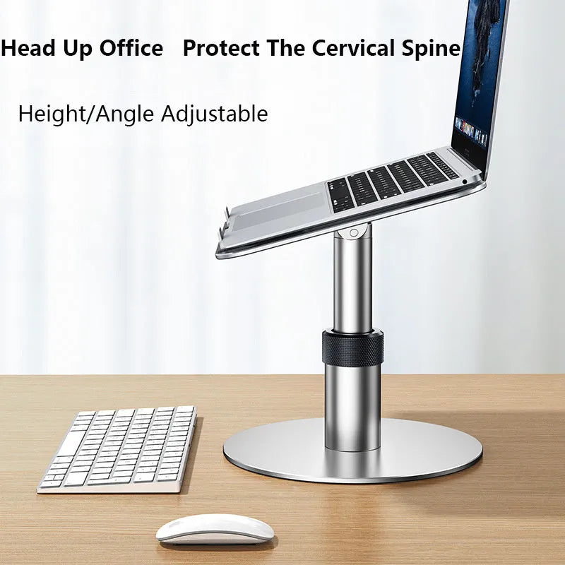 Silver adjustable aluminium alloy laptop stand on a car back seat, showing height adjustment and ventilation holes.