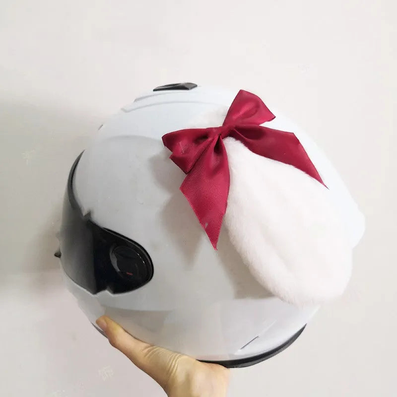 Carbon fibre rabbit ear decoration for a motorcycle helmet in various colours.