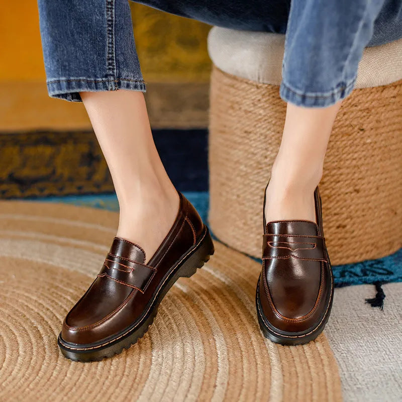 Round head low heel leather shoes for women in vintage brown, side view showing shallow mouth and low heel