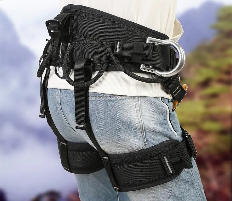Black polyester half body seat belt with adjustable waist and thigh straps for climbing and rescue