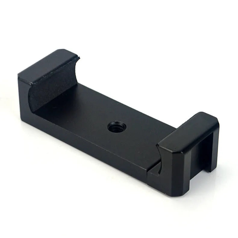 Silver aluminium alloy handheld phone mounting bracket for table top tripods, shown next to an iPhone.