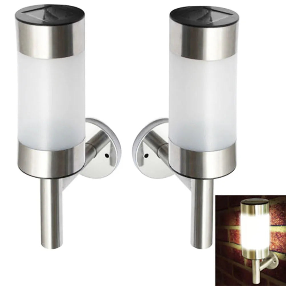 White solar wall light with stainless steel mount measuring 7.6x12x25cm
